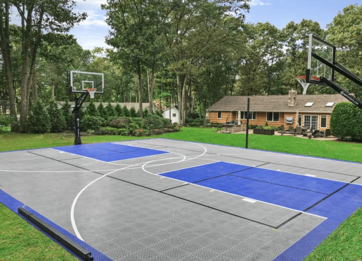 Professional Concrete Basketball Court installation in Charlotte, North Carolina by Local Concrete Charlotte — commercial-grade base prep, 6-inch compacted aggregate, expansion joints sawn within 12 hours.